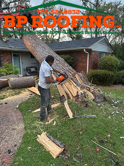 Cutting Tree off a roof in Augusta GA